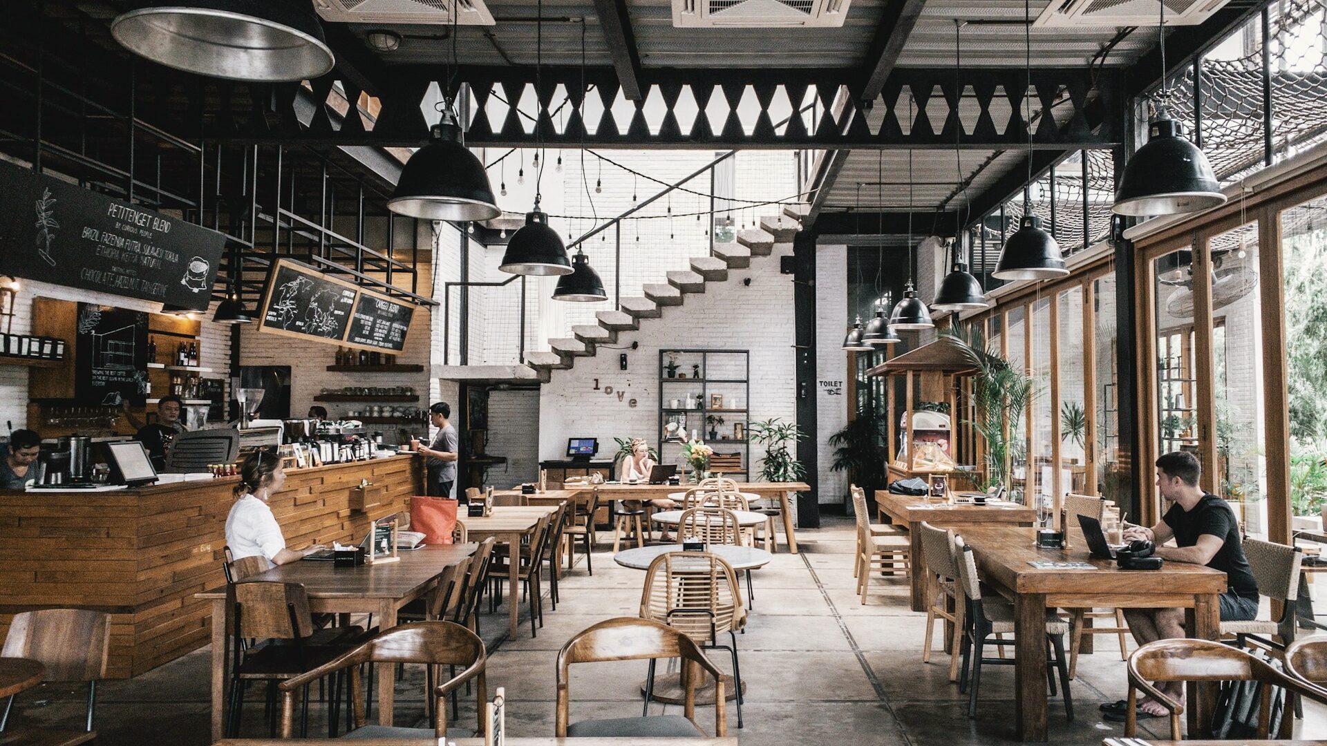 Cozy neighborhood restaurant interior with soft lighting