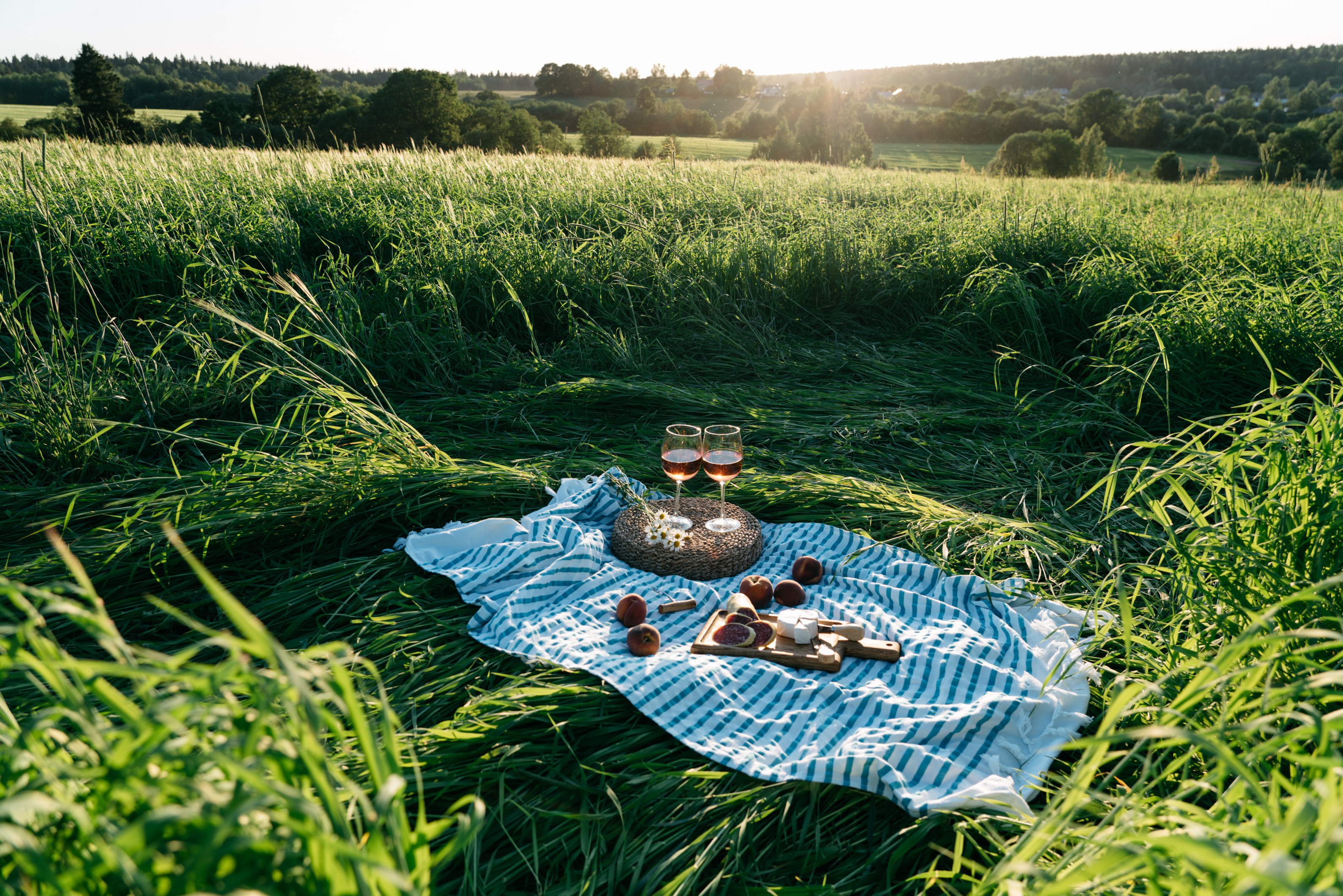 A picnic with wine at sunset