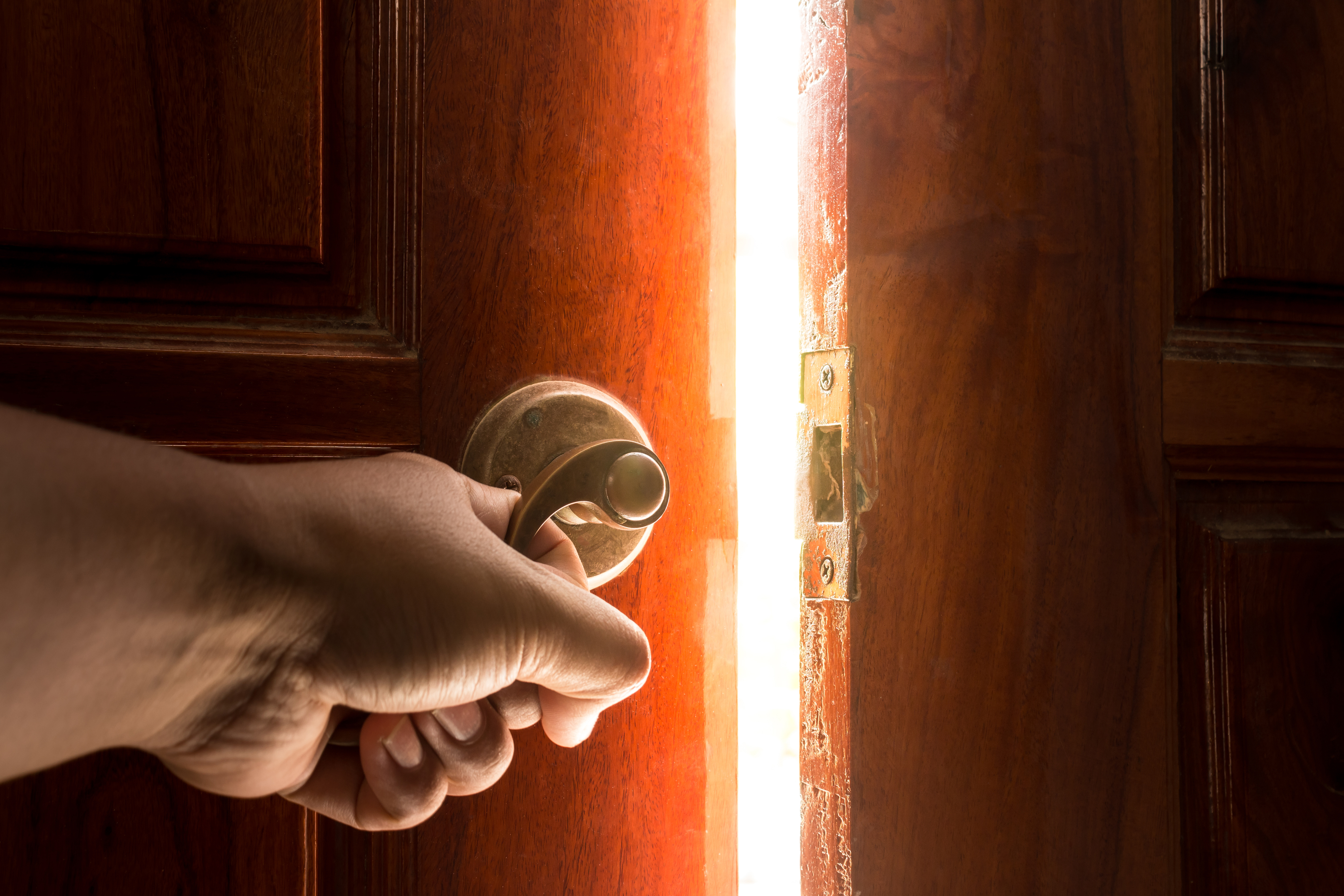 A door opening to soft light